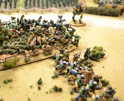 The ork and Imperial lines meet in vicious conflict.