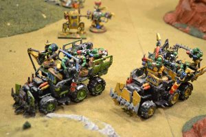 Ork Trukks move flat out toward the Imperial line.